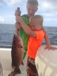 Black Snapper just caught by boy