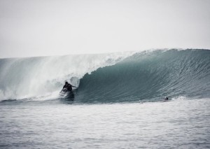 eight foot wave with surfer